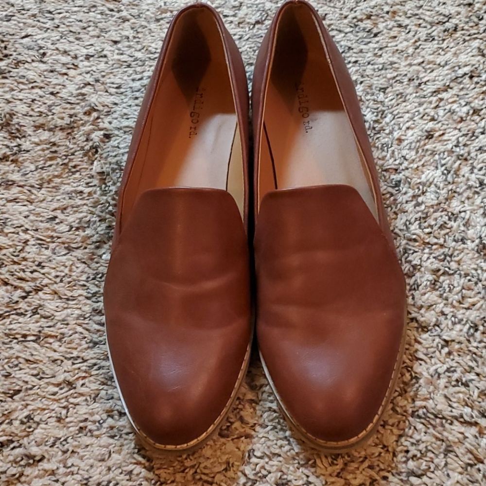 Brown leather flats